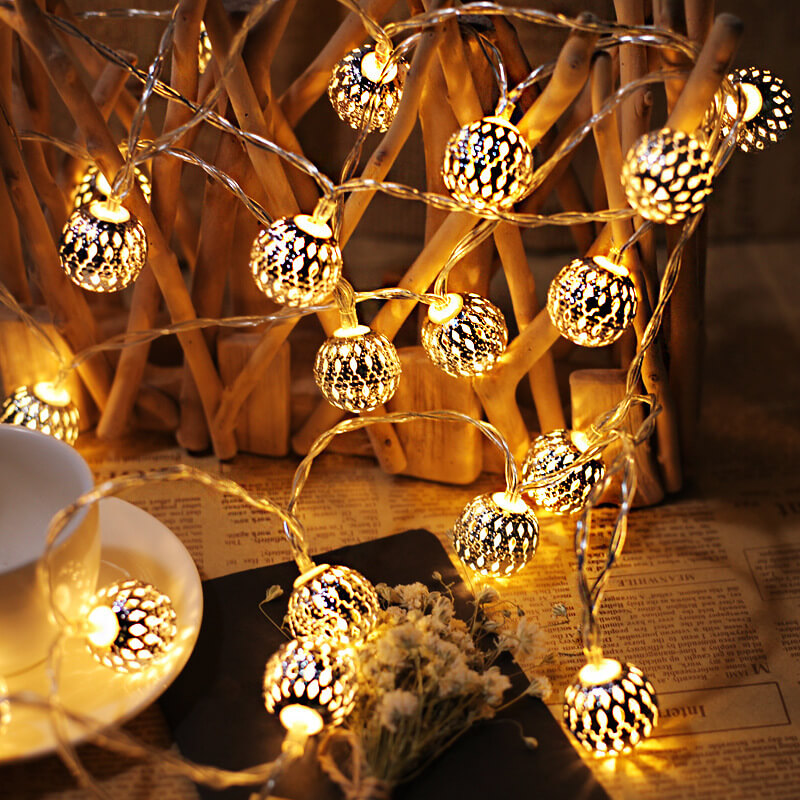 Solar Powered Garden String Lights With Moroccan Patterned Ball Lanterns