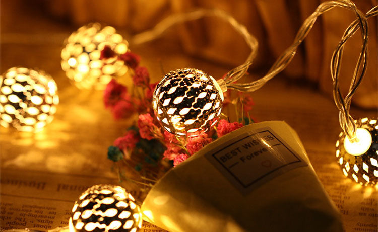 Solar Powered Garden String Lights With Moroccan Patterned Ball Lanterns